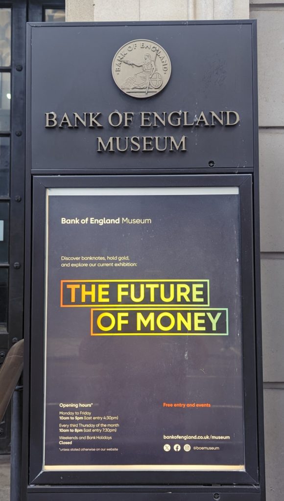 Poster outside the Bank of England Museum advertising The Future of Money exhibition